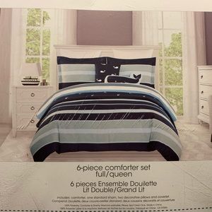 Striped comforter set with decorative pillows